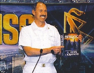 Don Cunningham as Executive Director of WISE International / Commanding Officer WISE International in his Sea Org uniform. Source is WISE magazine Prosperity issue 58